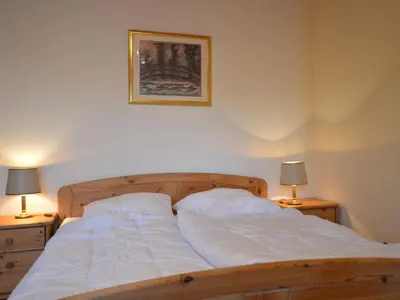 Ein Bett oder Betten in einem Zimmer der Unterkunft Spacious Eifel Escape