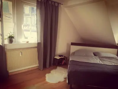 Ein Bett oder Betten in einem Zimmer der Unterkunft Wohnen bei den Brückenhäusern
