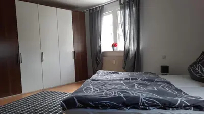 Ein Bett oder Betten in einem Zimmer der Unterkunft Wohnen bei den Brückenhäusern