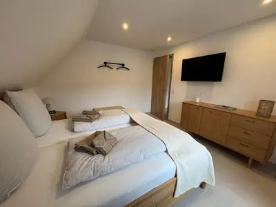 Ein Bett oder Betten in einem Zimmer der Unterkunft Zur Fausenburg