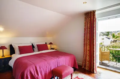 Ein Bett oder Betten in einem Zimmer der Unterkunft Wein und Landhaus Kallfels