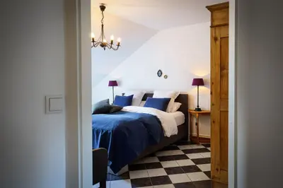 Ein Bett oder Betten in einem Zimmer der Unterkunft Wein und Landhaus Kallfels