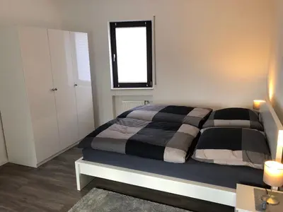 Ein Bett oder Betten in einem Zimmer der Unterkunft Ferienwohnung 