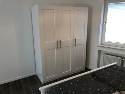 Ein Bett oder Betten in einem Zimmer der Unterkunft Ferienwohnung 