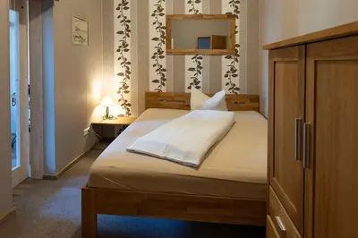 Ein Bett oder Betten in einem Zimmer der Unterkunft FW Rheinblick