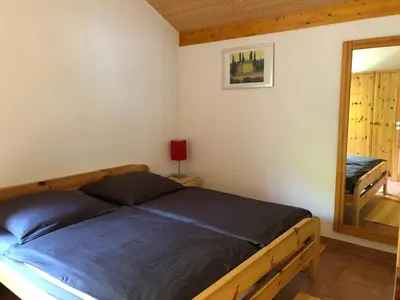 Ein Bett oder Betten in einem Zimmer der Unterkunft Ferienwohnung Karl