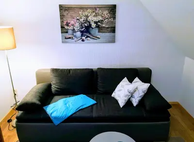 Ein Sitzbereich in der Unterkunft Ferienwohnung Maria Laach 2
