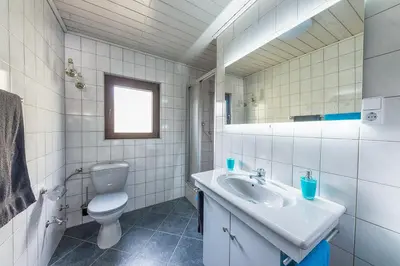 Ein Badezimmer in der Unterkunft Ferienwohnung Maria Laach 2