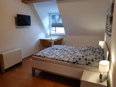Ein Bett oder Betten in einem Zimmer der Unterkunft Ferienhaus Würzgarten