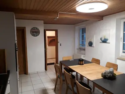 Ein Sitzbereich in der Unterkunft Ferienhaus Würzgarten
