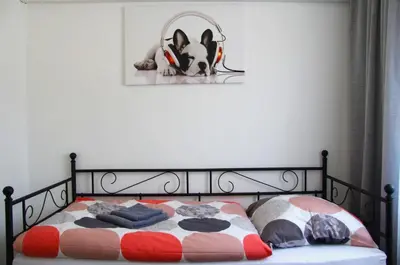 Ein Bett oder Betten in einem Zimmer der Unterkunft Geräumige 4 Zimmer Wohnung an den Kaiserthermen
