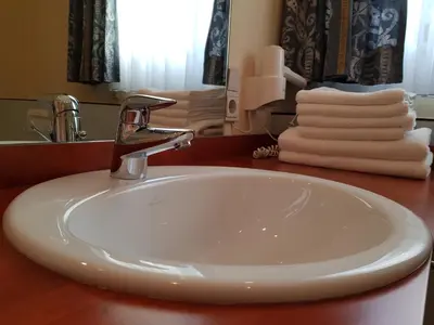 Ein Badezimmer in der Unterkunft Hotel 