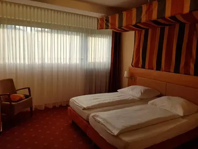 Ein Bett oder Betten in einem Zimmer der Unterkunft Hotel 