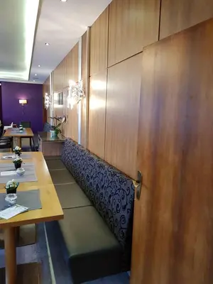 Ein Sitzbereich in der Unterkunft Hotel 