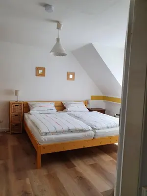Ein Bett oder Betten in einem Zimmer der Unterkunft Haus Zwanzig