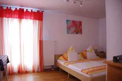 Ein Bett oder Betten in einem Zimmer der Unterkunft Gästehaus Steuer