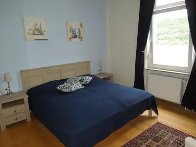 Ein Bett oder Betten in einem Zimmer der Unterkunft Weingut Nies