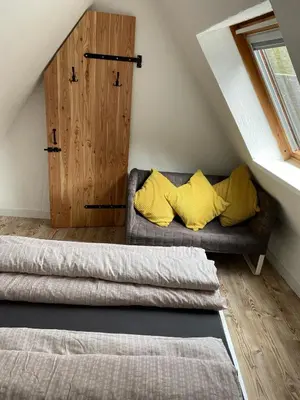 Ein Bett oder Betten in einem Zimmer der Unterkunft Schöne Ferienwohnung Altes Gebälk Fachwerkhaus
