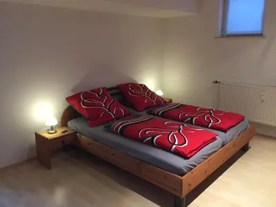 Ein Bett oder Betten in einem Zimmer der Unterkunft Ferienwohnung Mimi Souterrainwohnung
