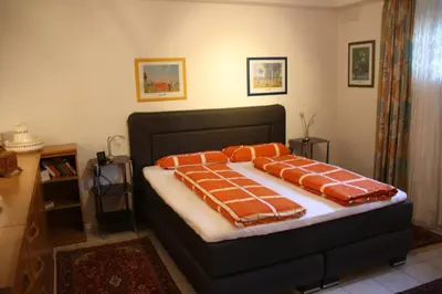 Ein Bett oder Betten in einem Zimmer der Unterkunft Ferienwohnung Inga