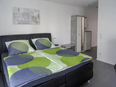 Ein Bett oder Betten in einem Zimmer der Unterkunft Ferienapartment im Augustinus Park