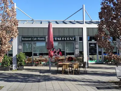 Ein Restaurant oder anderes Speiselokal in der Unterkunft Ferienapartment im Augustinus Park