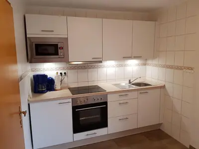 Küche/Küchenzeile in der Unterkunft gemütliche Ferienwohnung in Kaifenheim