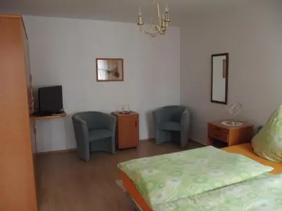 Ein Bett oder Betten in einem Zimmer der Unterkunft Hotel Haus Irsfeld