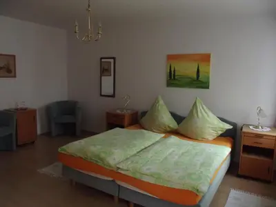 Ein Bett oder Betten in einem Zimmer der Unterkunft Hotel Haus Irsfeld