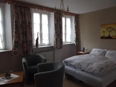 Ein Bett oder Betten in einem Zimmer der Unterkunft Hotel Haus Irsfeld