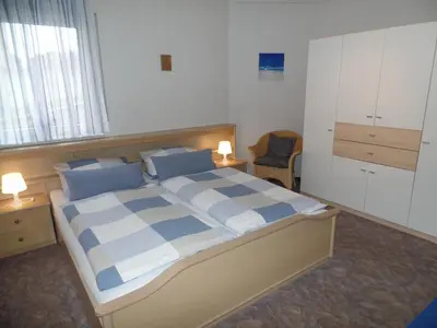 Ein Bett oder Betten in einem Zimmer der Unterkunft Ferienwohnung Erz