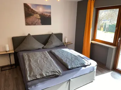 Ein Bett oder Betten in einem Zimmer der Unterkunft Ferienweingut Peter-Jos. Hauth