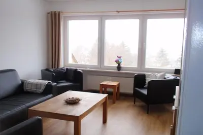 Ein Sitzbereich in der Unterkunft Villa Hochwald Familienhaus