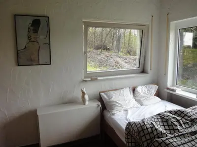 Ein Bett oder Betten in einem Zimmer der Unterkunft Holiday Home Moselle with Private Sauna