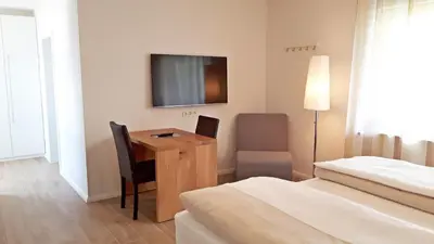 Ein Bett oder Betten in einem Zimmer der Unterkunft Weingut Gehlen-Cornelius