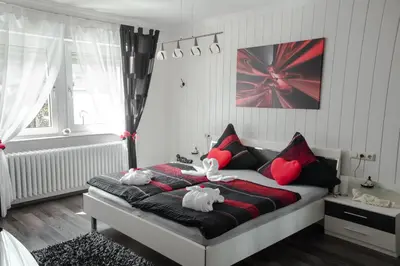 Ein Bett oder Betten in einem Zimmer der Unterkunft Gästehaus Edith, 4-Sterne für 2 Personen