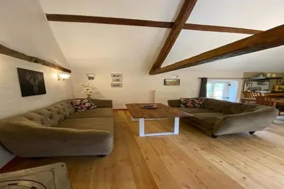 Ein Sitzbereich in der Unterkunft Mosel Mill Garden Stay