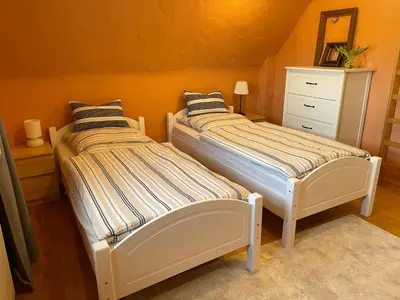 Ein Bett oder Betten in einem Zimmer der Unterkunft Gästezimmer Adenau