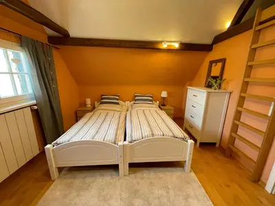 Ein Bett oder Betten in einem Zimmer der Unterkunft Gästezimmer Adenau