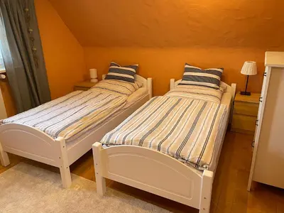 Ein Bett oder Betten in einem Zimmer der Unterkunft Gästezimmer Adenau