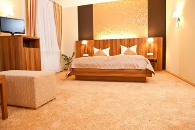 Ein Bett oder Betten in einem Zimmer der Unterkunft Dagstuhler Hof