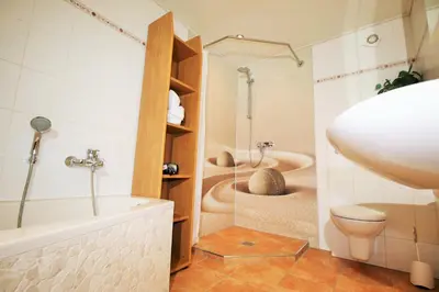 Ein Badezimmer in der Unterkunft Gästehaus Kön