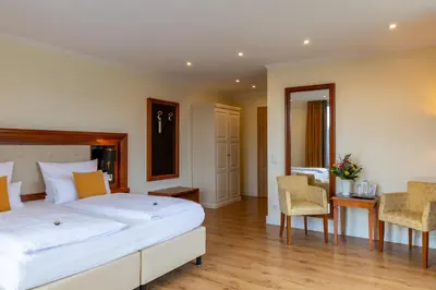 Ein Bett oder Betten in einem Zimmer der Unterkunft Hotel Schloss Rheinfels