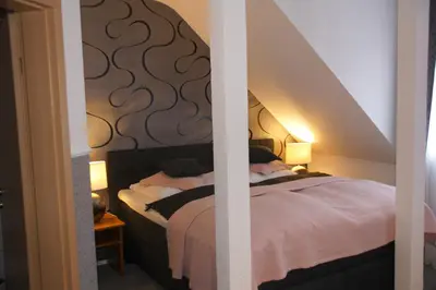 Ein Bett oder Betten in einem Zimmer der Unterkunft SkinSpa Apartments Idar-Oberstein