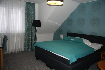 Ein Bett oder Betten in einem Zimmer der Unterkunft SkinSpa Apartments Idar-Oberstein
