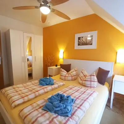 Ein Bett oder Betten in einem Zimmer der Unterkunft Living Above The Roofs Of Cochem