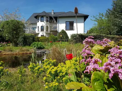 Ein Garten an der Unterkunft Rosenschlösschen
