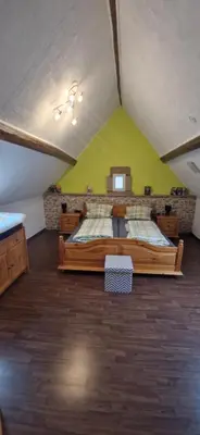 Ein Bett oder Betten in einem Zimmer der Unterkunft Ferienhaus an See