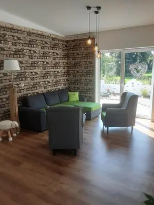 Ein Sitzbereich in der Unterkunft Ferienhaus am Apfelbaum