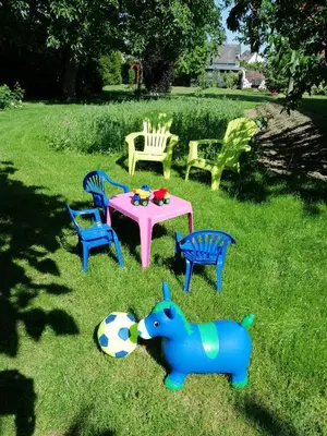 Ein Garten an der Unterkunft Ferienhaus am Apfelbaum